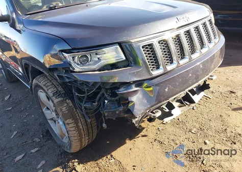 2014 Jeep Grand Cherokee Overland z USA, uszkodzony, nr VIN 1C4RJFCTXEC125249